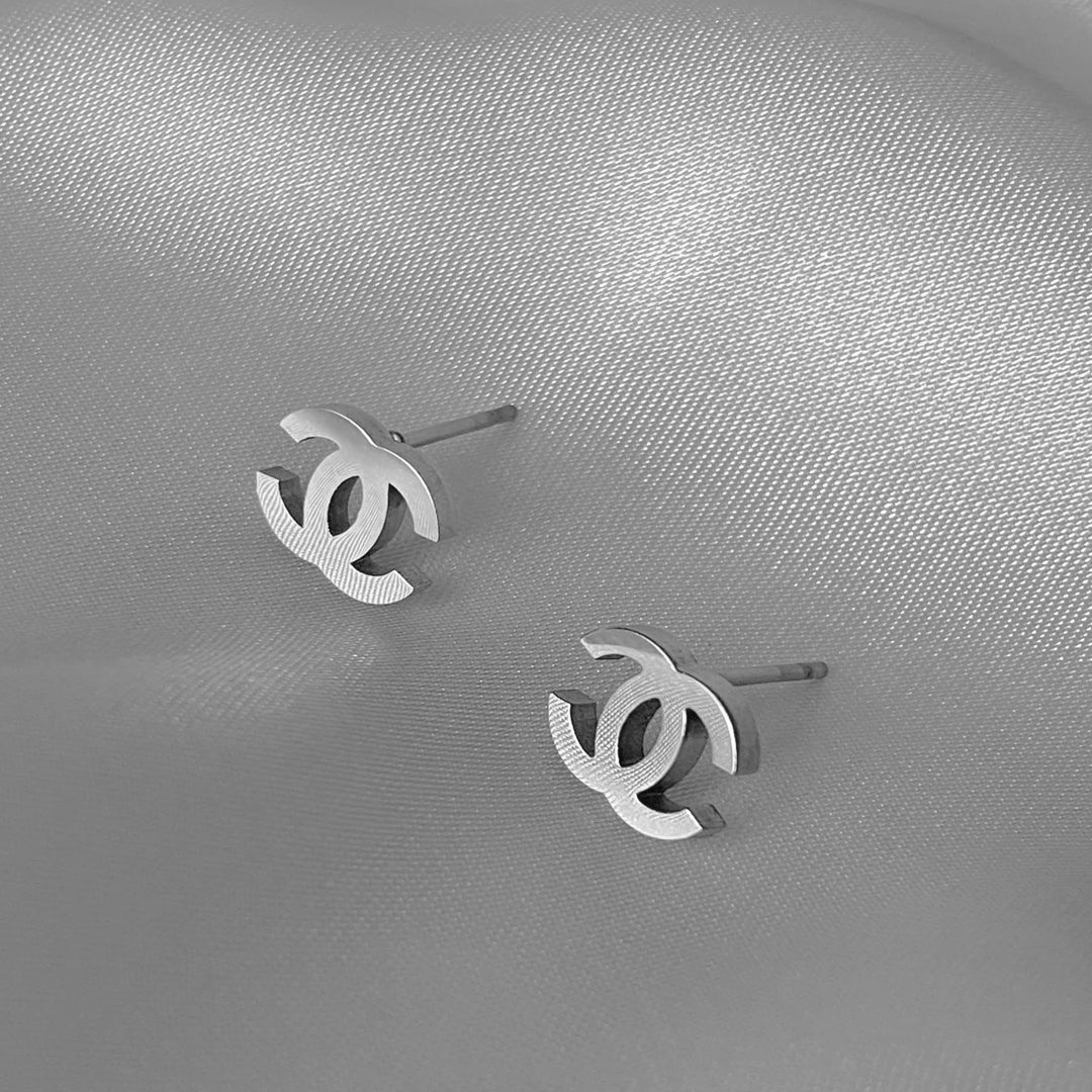 CHANEL CLASSIC. Reworked Silver CC Stud Earrings IMPERFECT