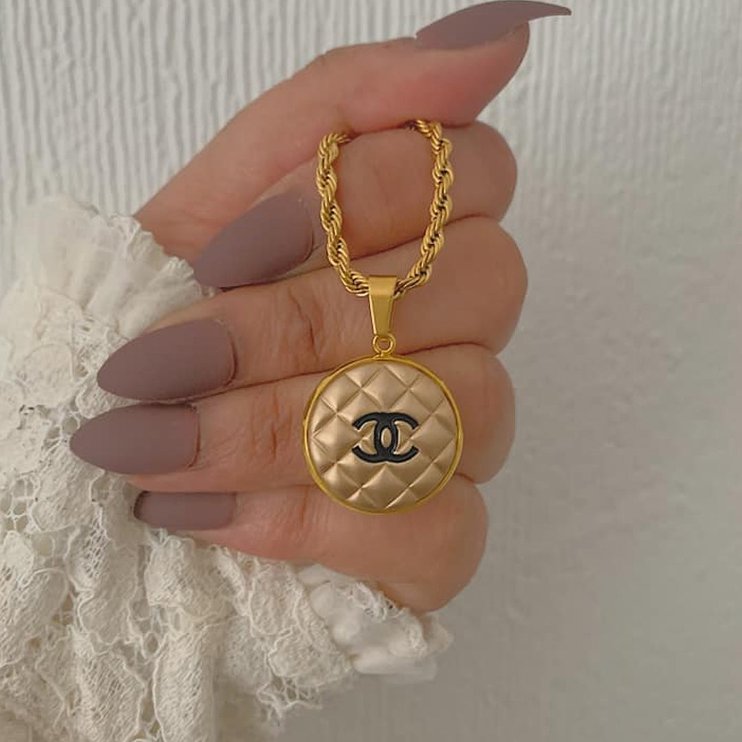 CHANEL OREILLER. Reworked Gold CC Medallion Pendant Necklace