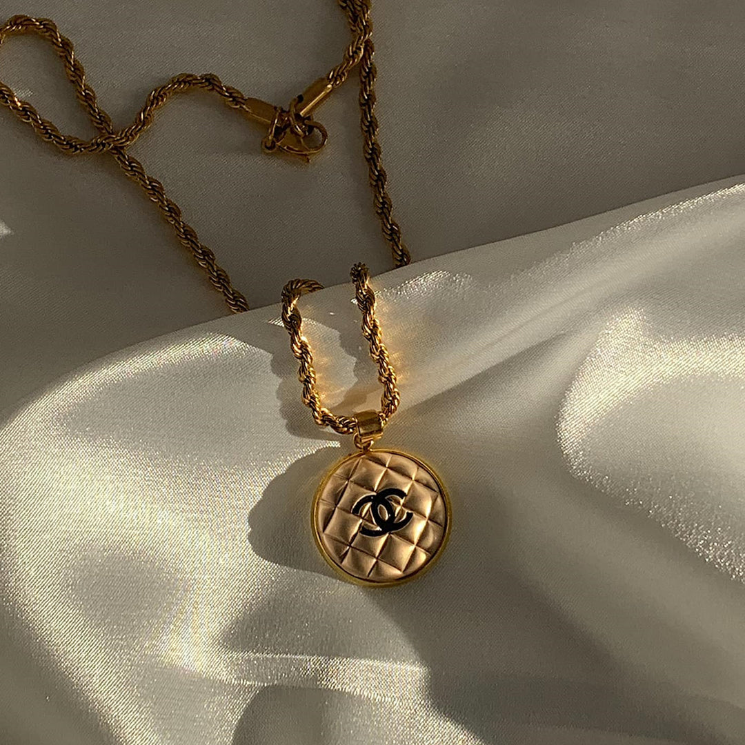 CHANEL OREILLER. Reworked Gold CC Medallion Pendant Necklace