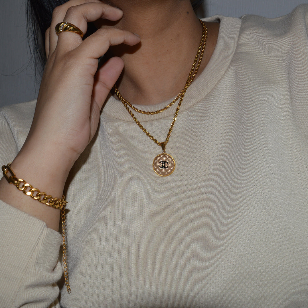 CHANEL OREILLER. Reworked Gold CC Medallion Pendant Necklace