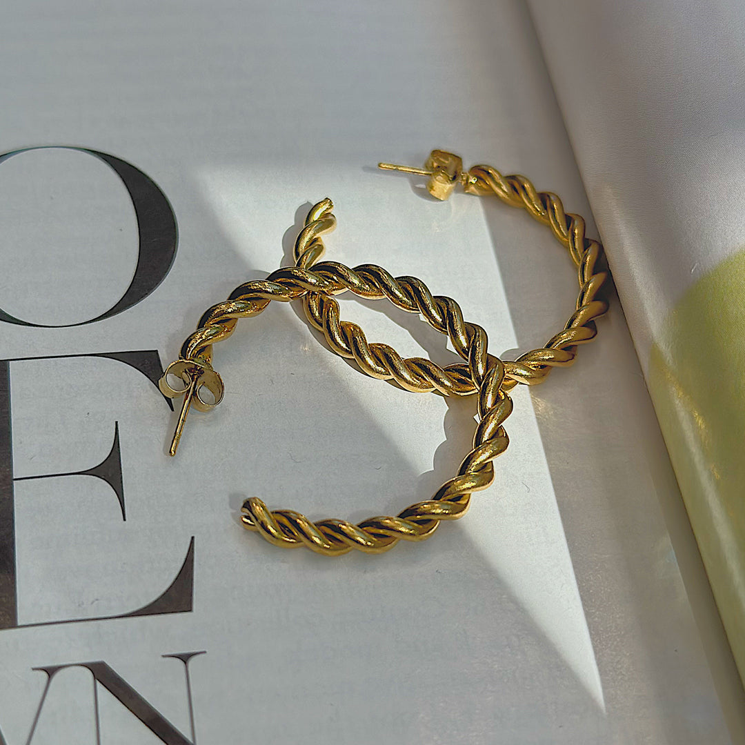 TRESSER. Gold Twist Hoop Earrings