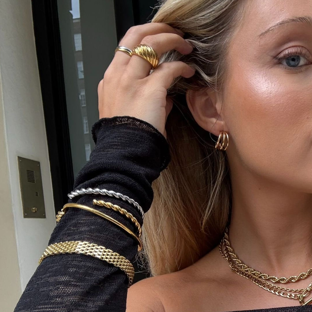VOGUE. Gold Croissant Dome Ring