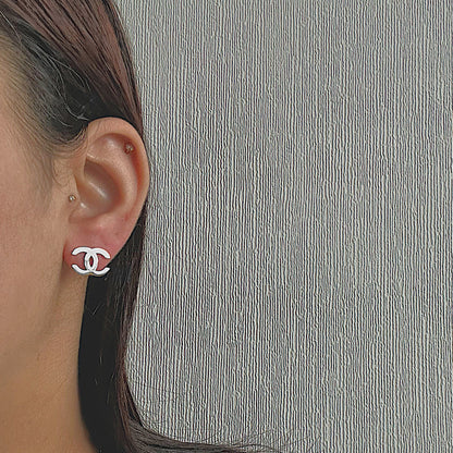 CHANEL CLASSIC. Reworked Silver CC Stud Earring