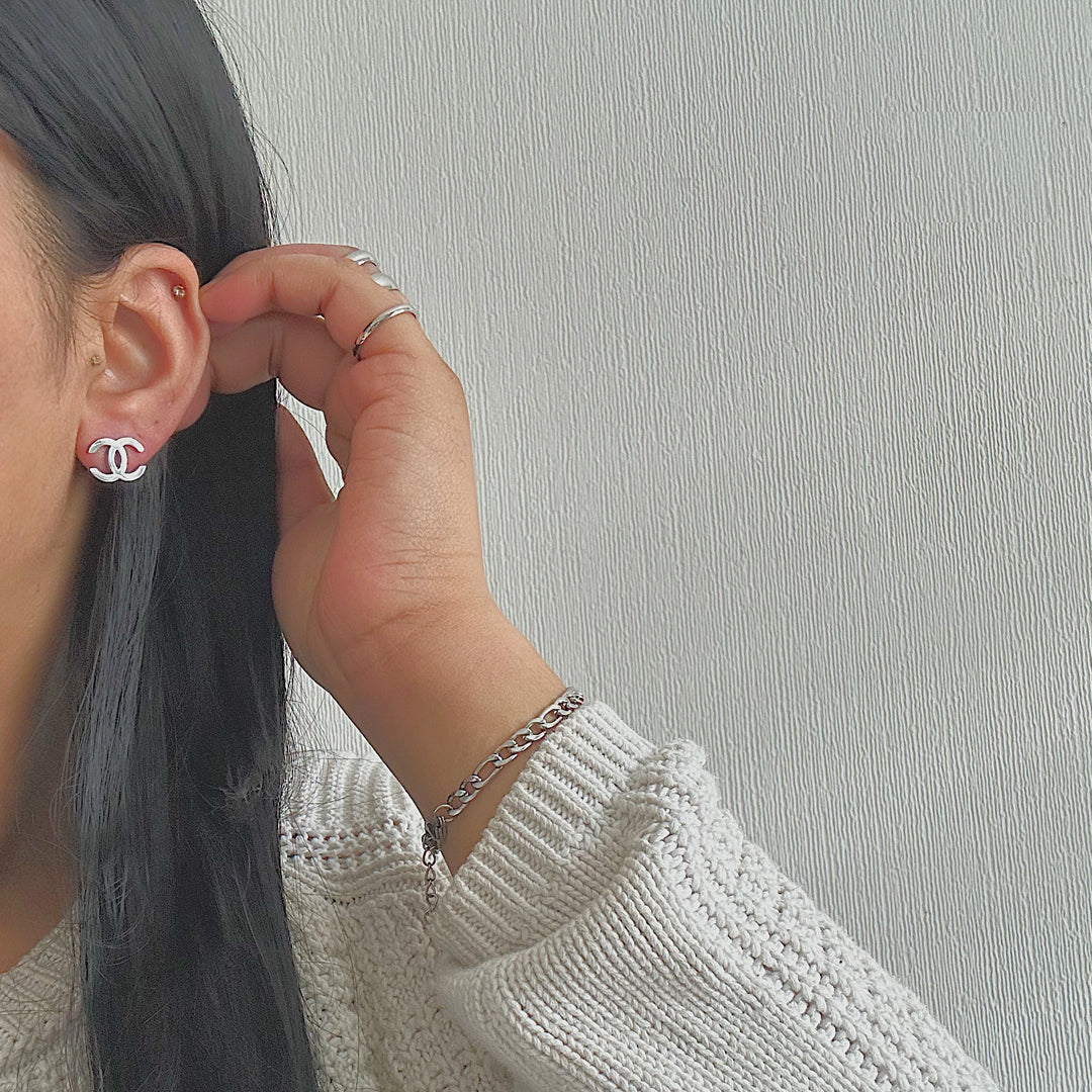 CHANEL CLASSIC. Reworked Silver CC Stud Earrings IMPERFECT