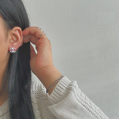 CHANEL CLASSIC. Reworked Silver CC Stud Earrings IMPERFECT