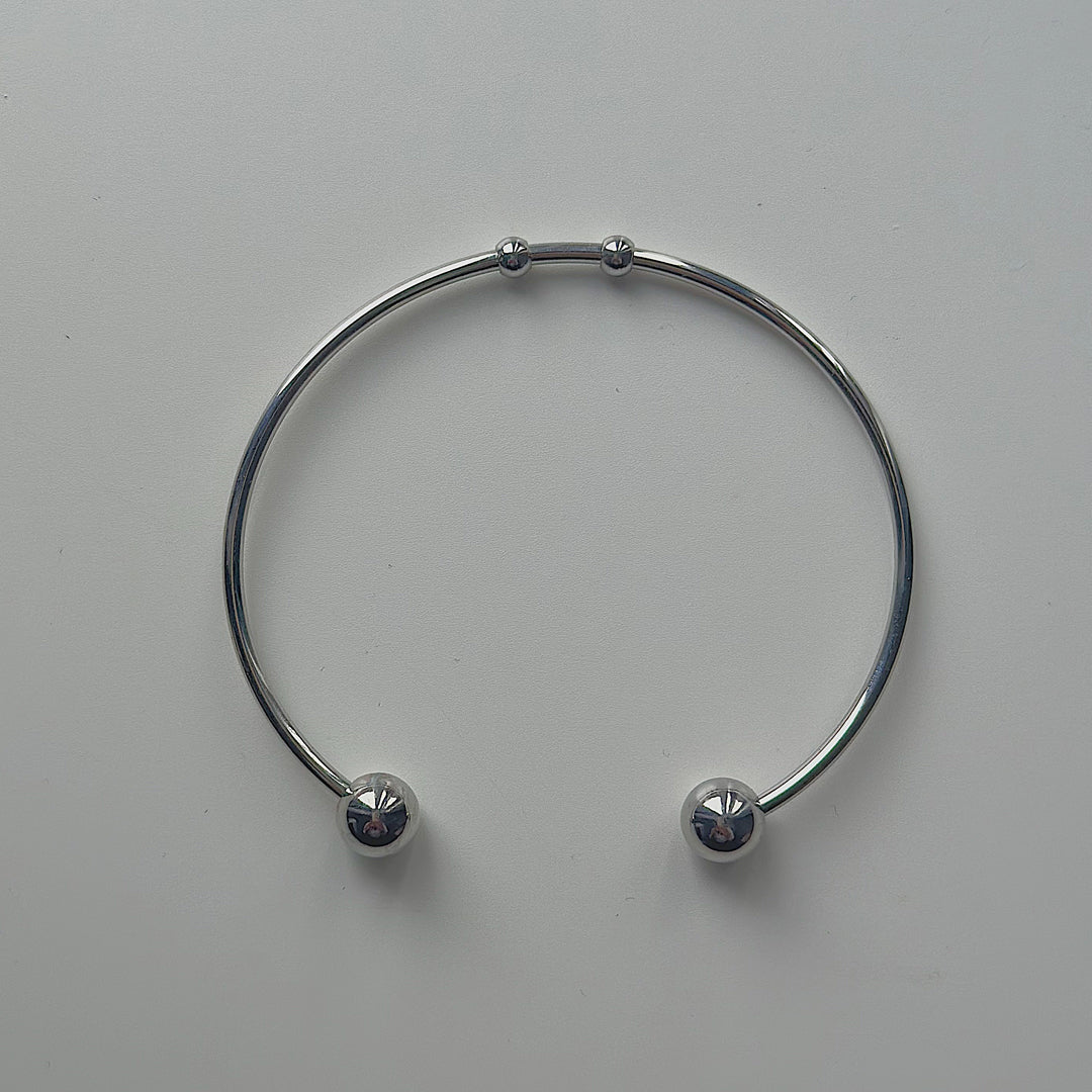 CAMBRIDGE. Silver Ball Cuff Bangle