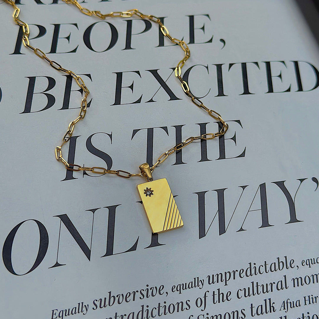 CARTER. Gold Crystal Tag Necklace