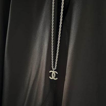CHANEL CLASSIC. Reworked Silver CC Pendant Necklace