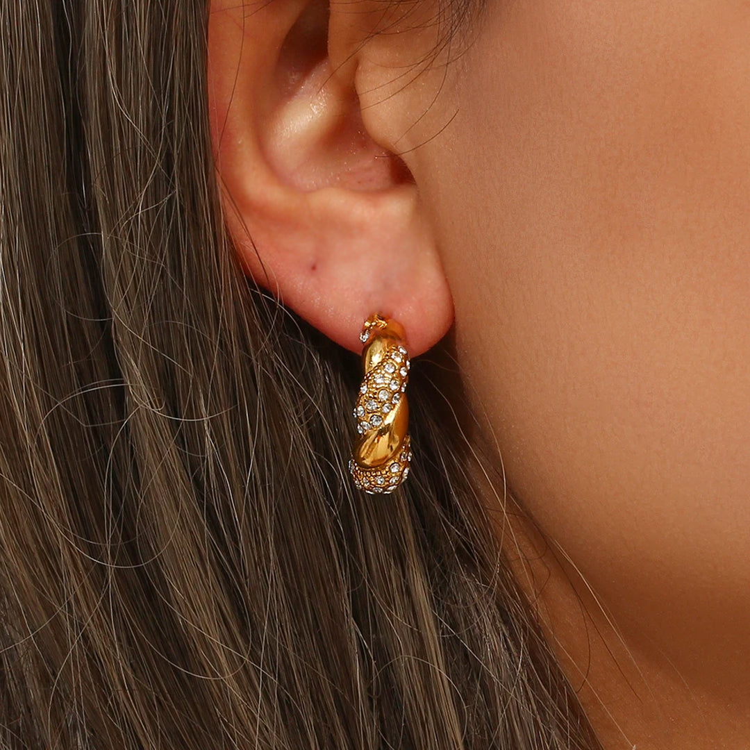 HOLLYWOOD. Gold Crystal Twist Croissant Hoop Earrings