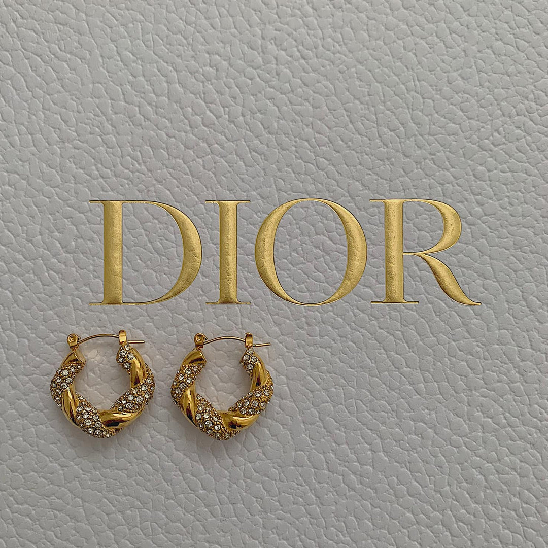 HOLLYWOOD. Gold Crystal Twist Croissant Hoop Earrings