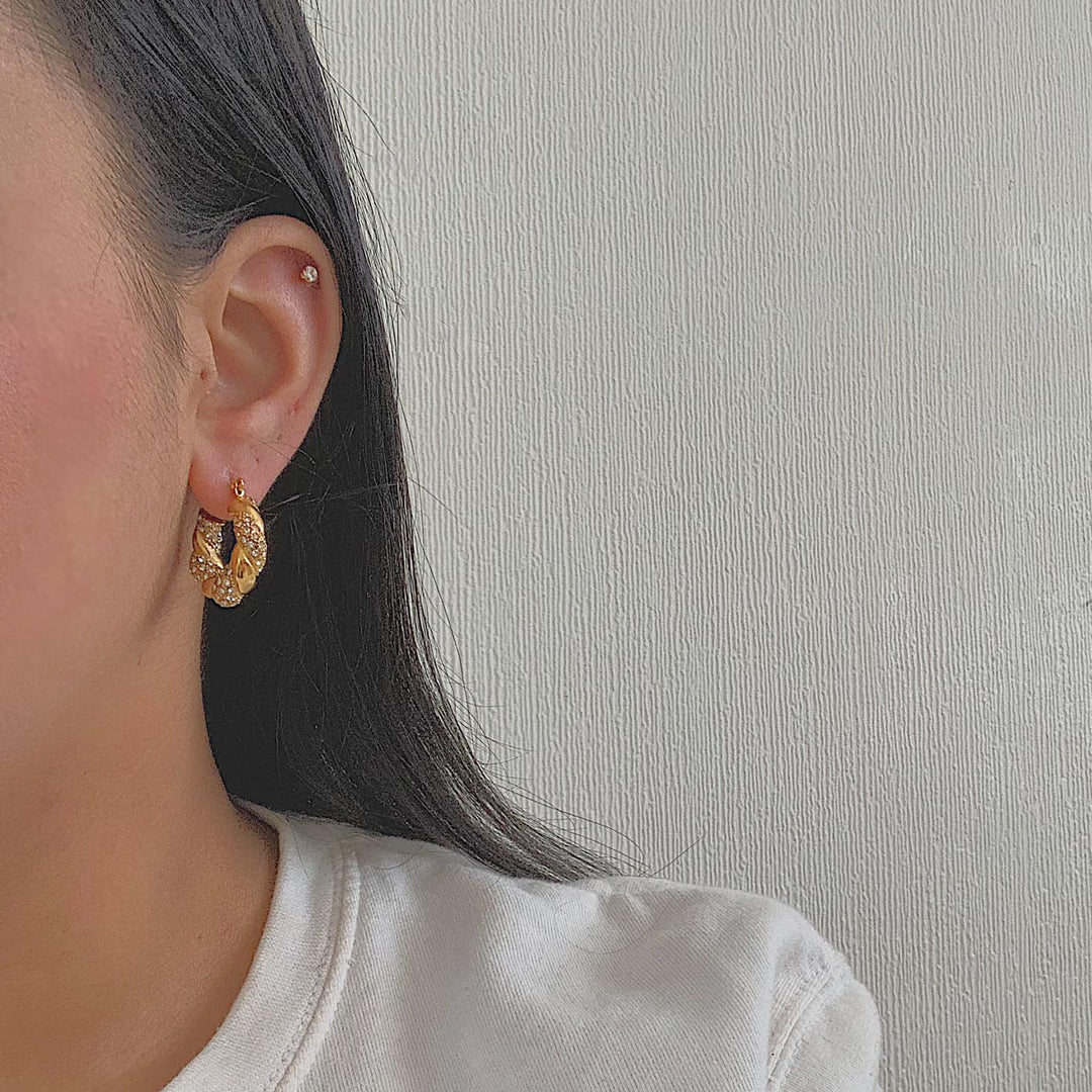 HOLLYWOOD. Gold Crystal Twist Croissant Hoop Earrings