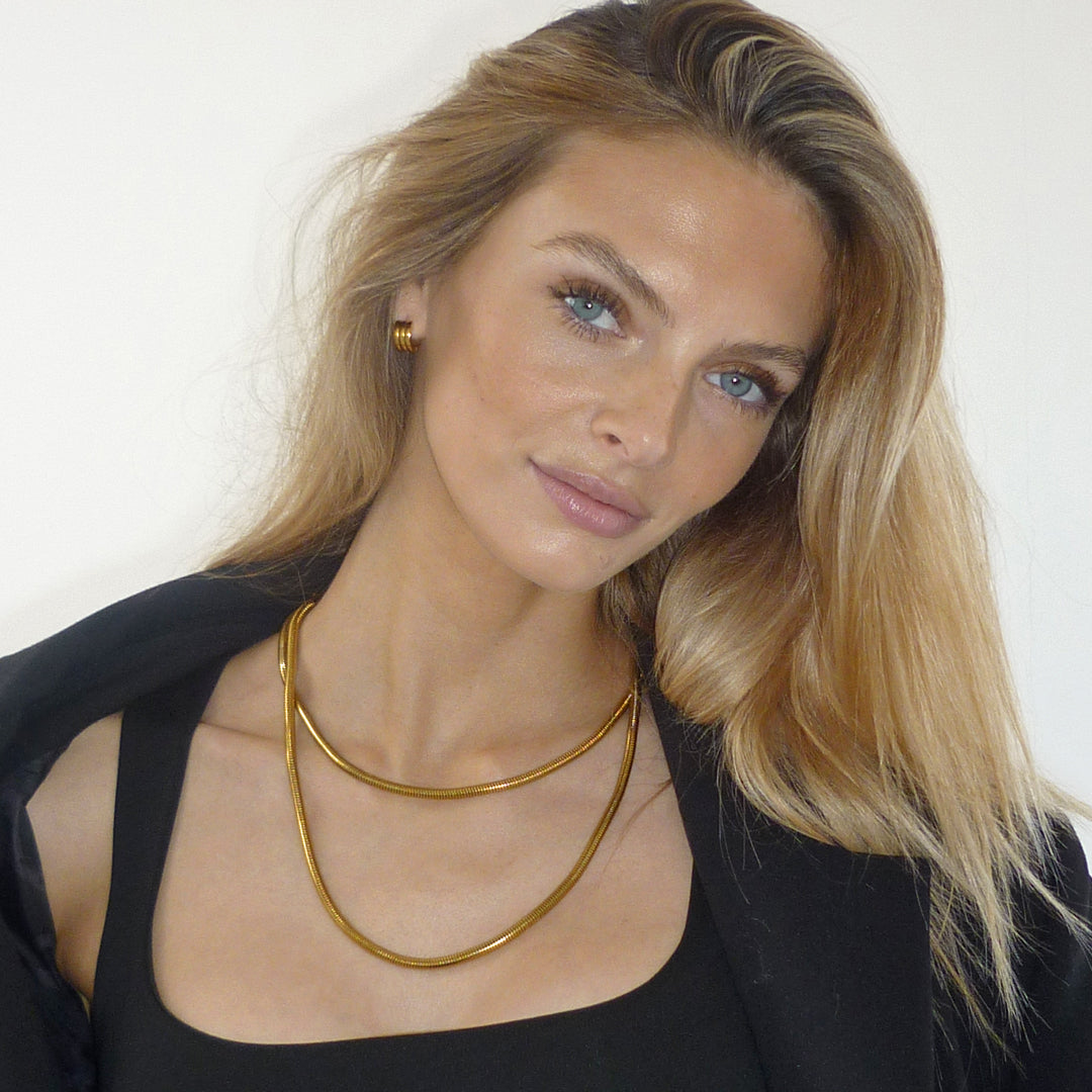 The Row. Gold Mini Ribbed Hoop Earrings