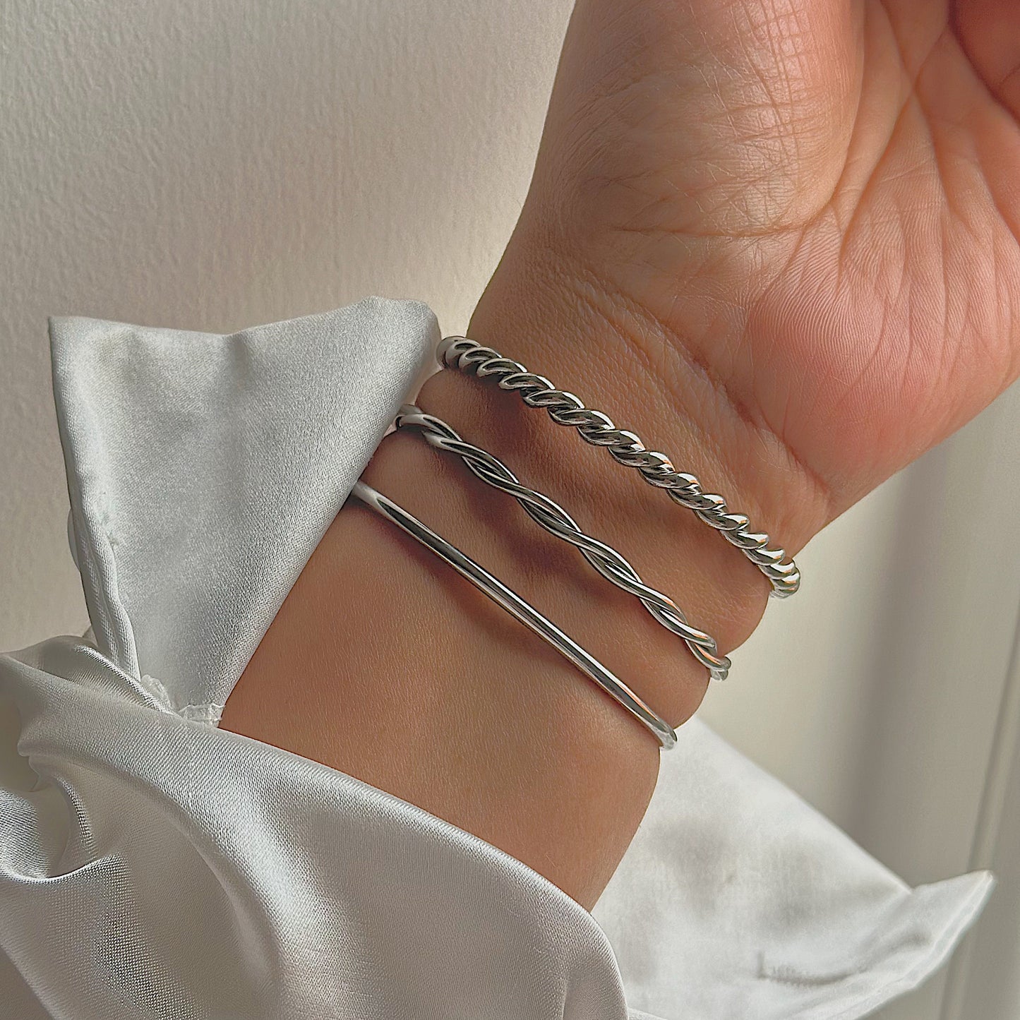 ISPAHAN. 3 Piece Silver Rope Bangle Set