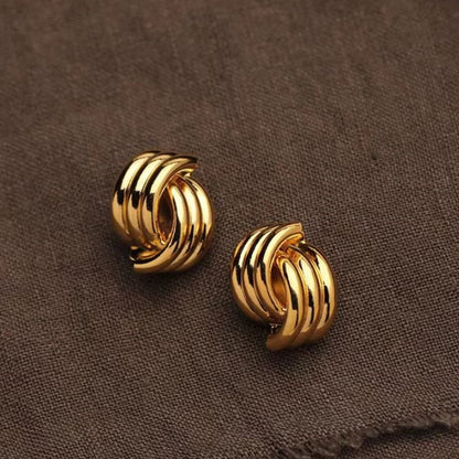 LISSOME. Gold Ribbed Knot Stud Earrings