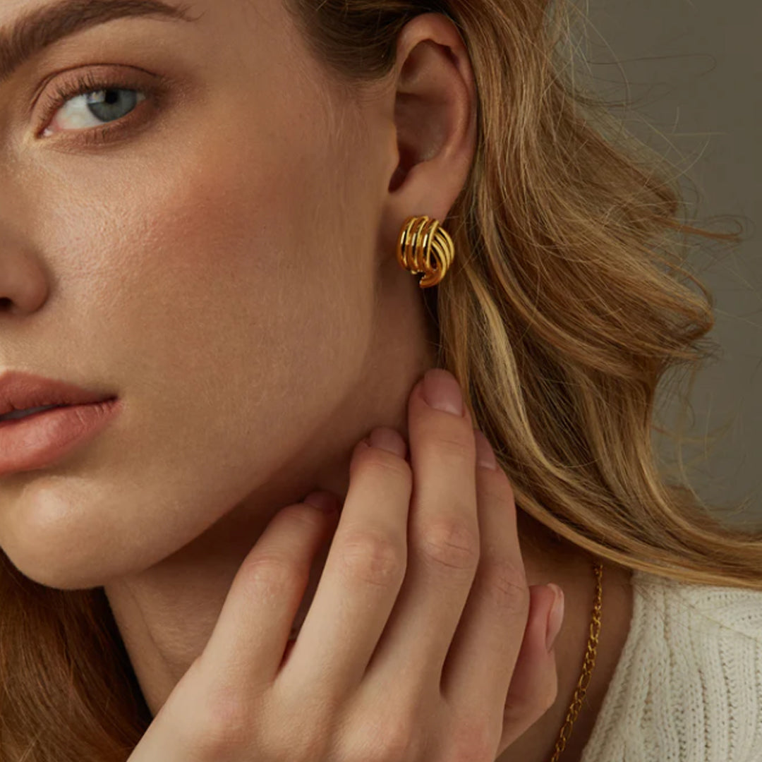 LISSOME. Gold Ribbed Knot Stud Earrings