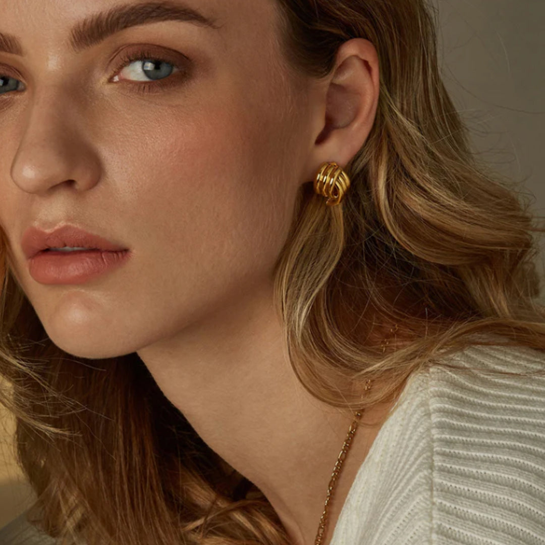 LISSOME. Gold Ribbed Knot Stud Earrings