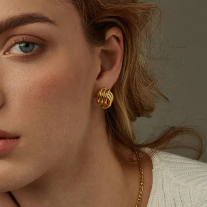 LISSOME. Gold Ribbed Knot Stud Earrings
