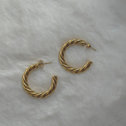 MUSE. Gold Twist Hoop Earrings