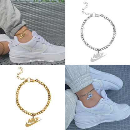 NIKE. Gold and Silver Swoosh Pendant Anklet Set