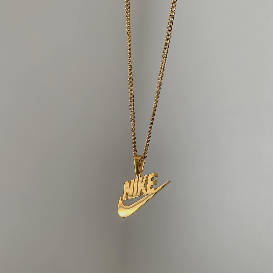 NIKE. Gold Swoosh Pendant Necklace