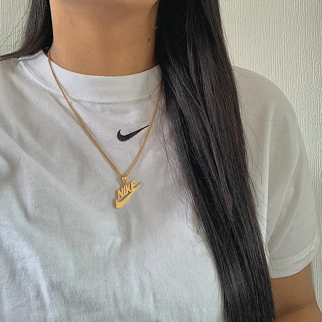 NIKE. Gold Swoosh Pendant Necklace