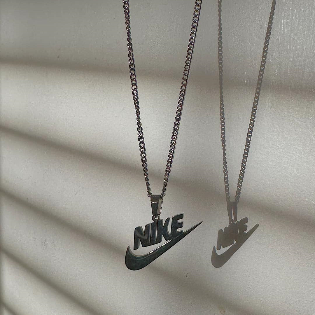 NIKE. Silver Swoosh Pendant Necklace