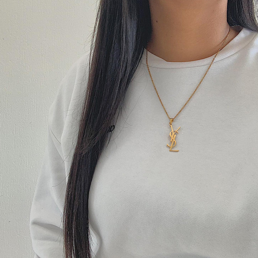 YSL MONOGRAM. Reworked Gold Pendant Necklace