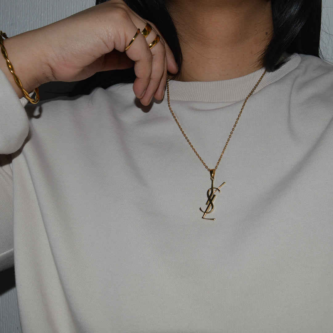 YSL MONOGRAM. Reworked Gold Pendant Necklace